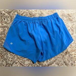 Lululemon hotty-hot shorts in the beautiful blue Nile color. NWOT, size 8!